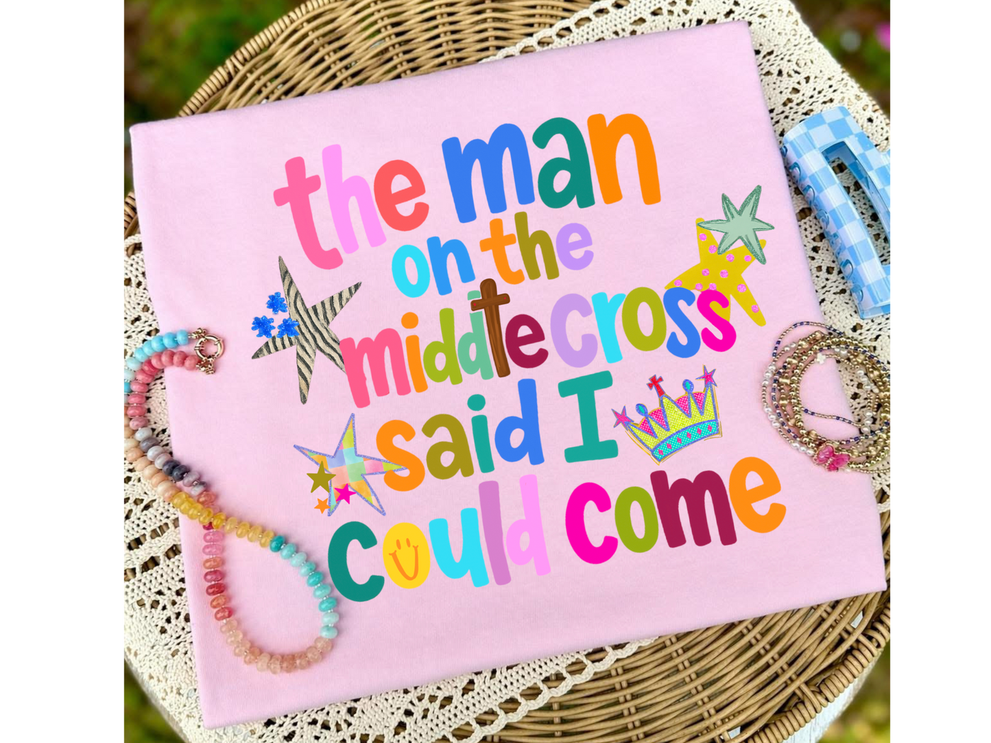 The man on the middle cross (pink)